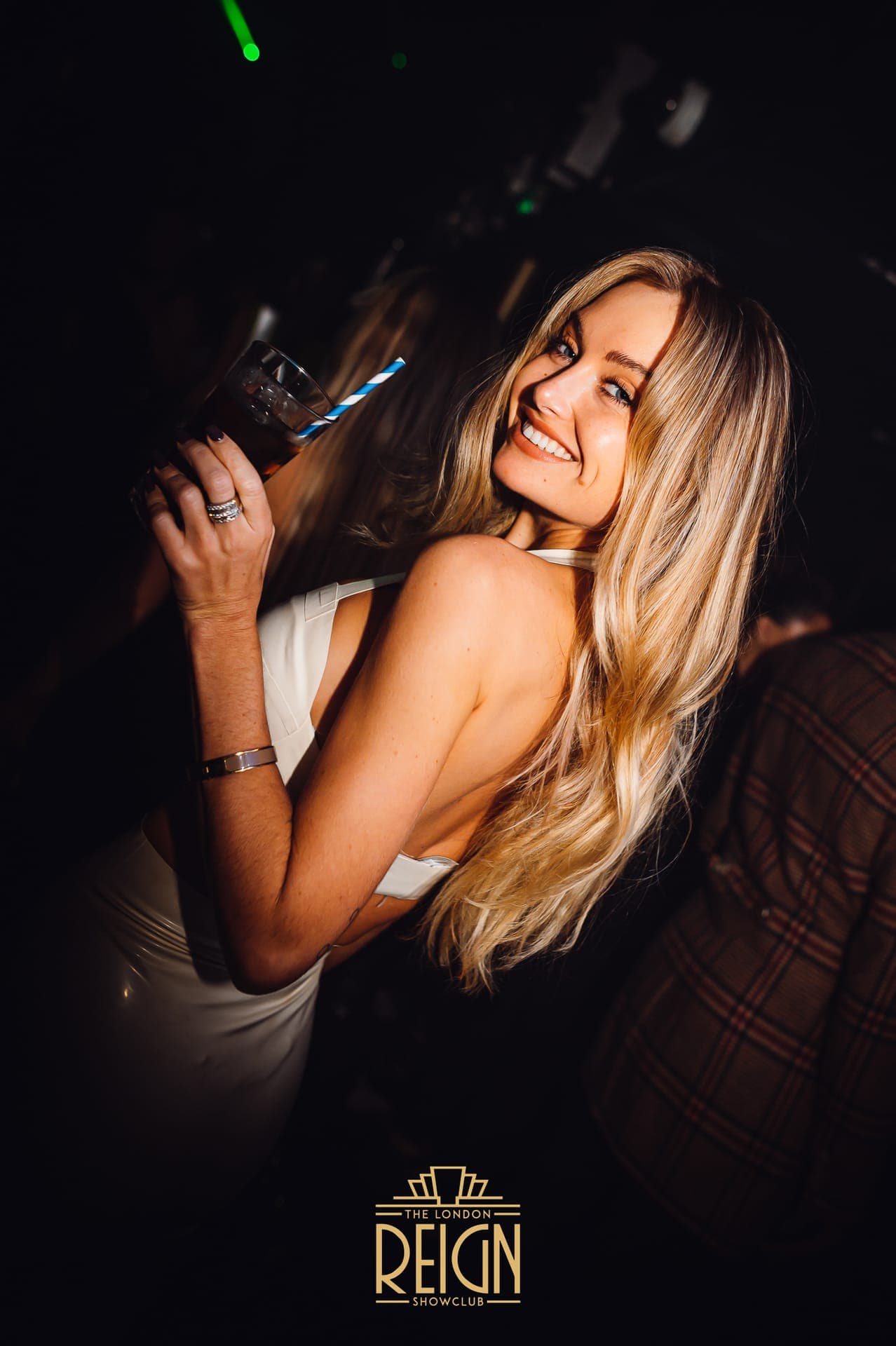 Celebrity nightlife scene at an exclusive London club with VIP bottle service