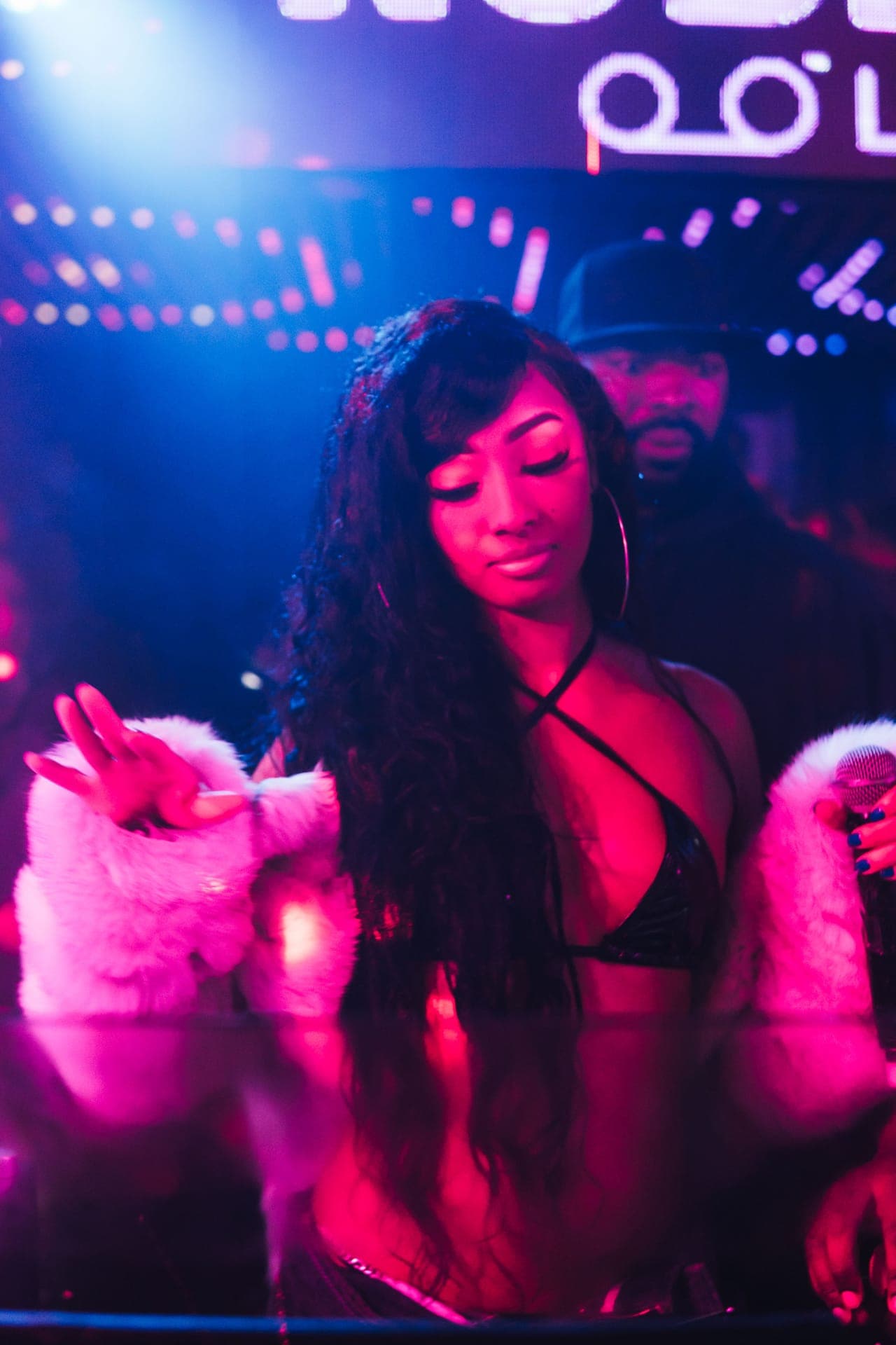 Luxury nightclub interior with bottle service table setup in Mayfair