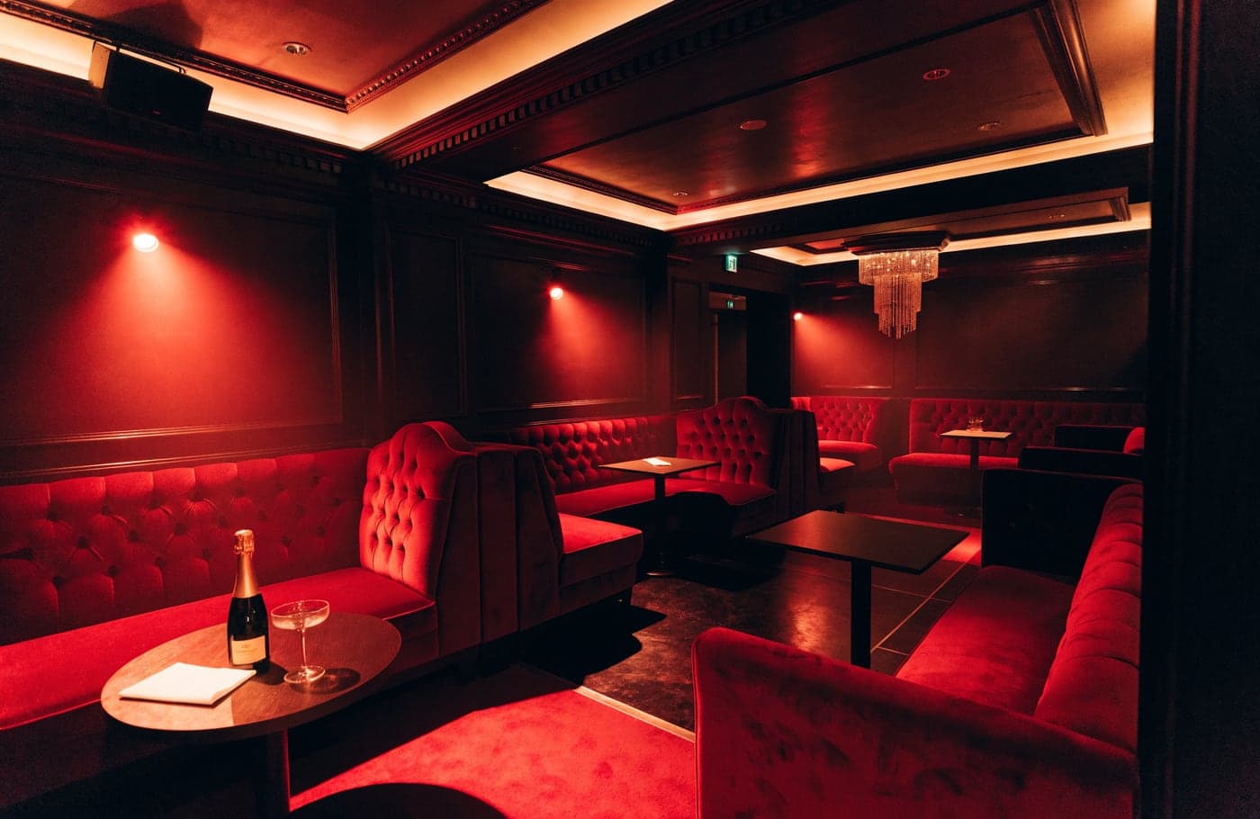 Rumour (formerly Tabu): red velvet booths, dark panelling and a chandelier in the main room on Dover Street